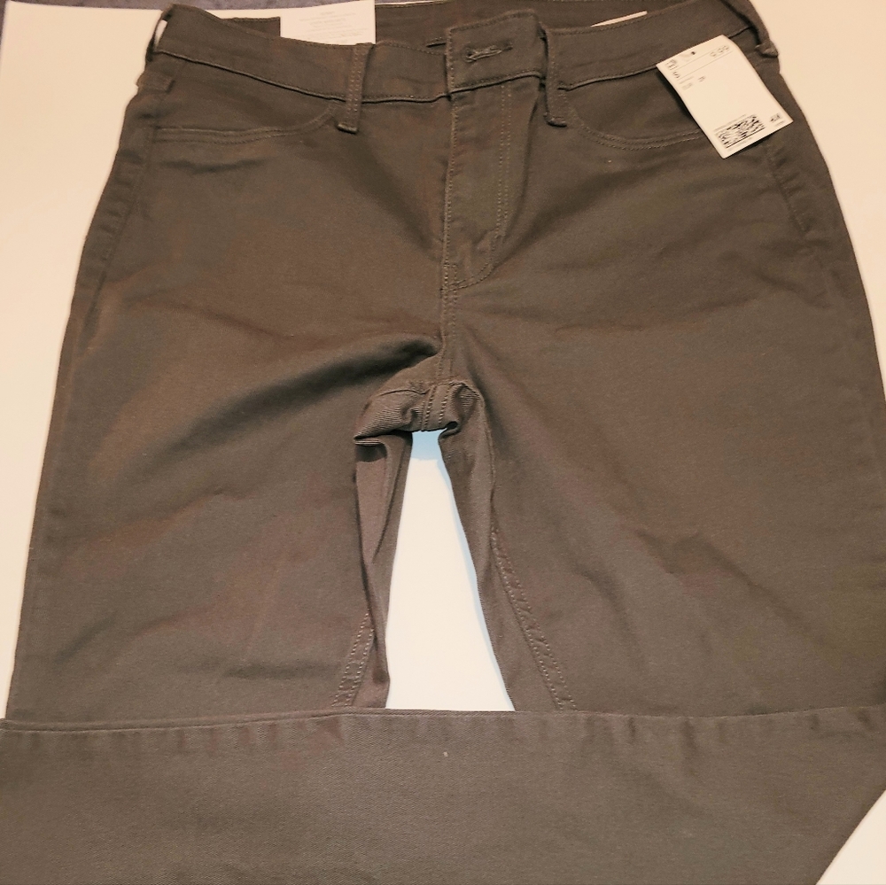 Olive Green Pants, size 29. Size comes small.